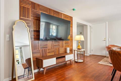 High End Living Room with XXL Flatscreen  Danish Design