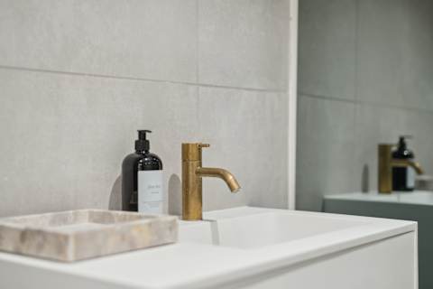 High End Bathroom Danish Design with Brass Faucet