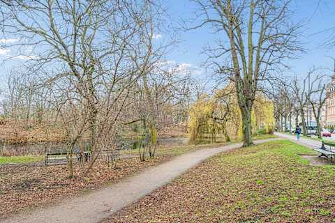 Enjoy peaceful walks in nearby green spaces — a perfect break from the vibrant city life.