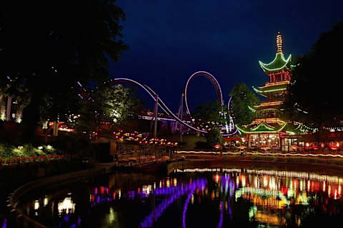 Just a short walk away — experience the magic of Tivoli Gardens, especially as it lights up in the evening.