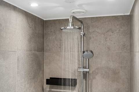Bathroom 1 Ground Floor:
Start your morning with a refreshing shower or unwind after the beach in this beautifully designed bathroom with elegant Scandinavian finishes.