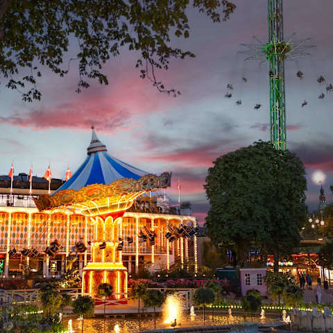 Just a short walk away — experience the magic of Tivoli Gardens, especially as it lights up in the evening.