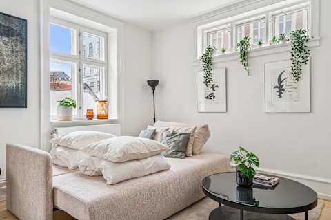Additional sleeping space in the living room with a comfortable sofa bed — great for families or groups traveling together.