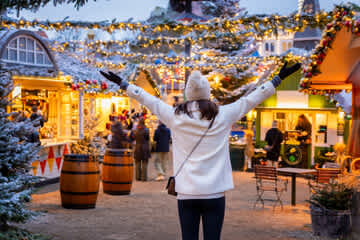 Just a short walk away — experience the magic of winter wonderland in Tivoli Gardens, especially as it lights up in the evening.
