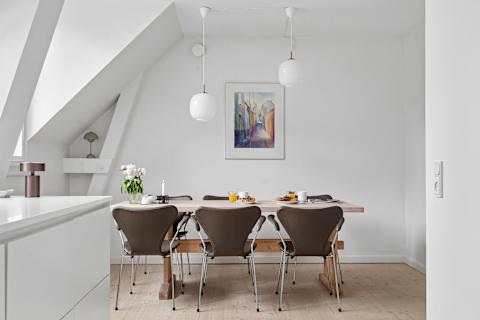 Spacious dining area perfect for shared meals, work, or relaxing evenings. Pure Hygge!