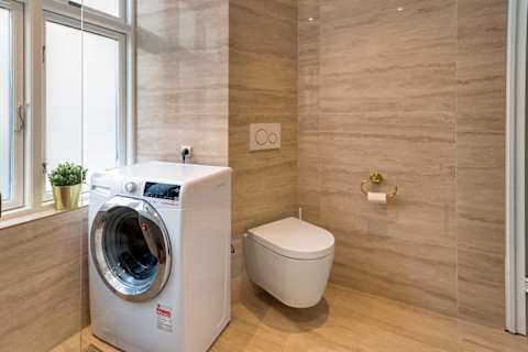 High end Bathroom with washer /  Italiens Tiles