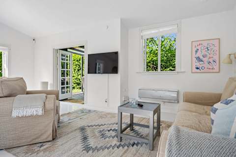 Bright Living Room for Relaxing Moments
A spacious and inviting living area filled with natural light, comfortable seating, and direct access to the terrace – the perfect place to unwind together.