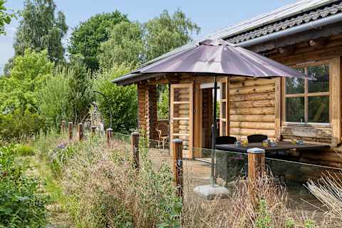 Spacious Terrace for Outdoor Living
Relax on the large wooden terrace, enjoy meals under the open sky, or simply unwind while taking in the peaceful countryside surroundings.