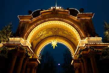 Just a short walk away — experience the magic of Tivoli Gardens, especially as it lights up in the evening.