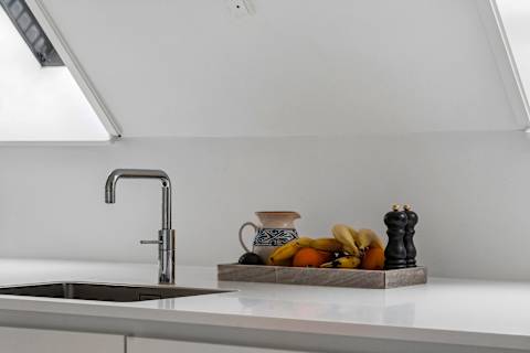 Fully equipped modern kitchen with everything needed for cooking during your stay.