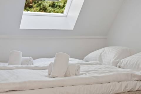 You'll always be welcomed with fresh hotel-quality towels beautifully prepared on your bed, adding a touch of luxury from the moment you arrive.