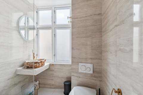 High end Bathroom with opaline tiles with rain shower