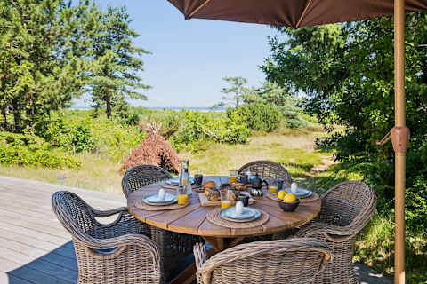 Start your day with breakfast overlooking the sea, surrounded by nature and the peaceful sound of the waves just beyond the garden.
