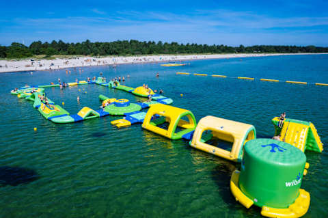 🏖️ Feddet Beach Resort
Just minutes away, enjoy sandy beaches, playgrounds, mini golf, water activities, and fun for the whole family.