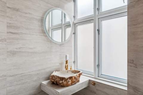 High end Bathroom with opaline tiles with rain shower