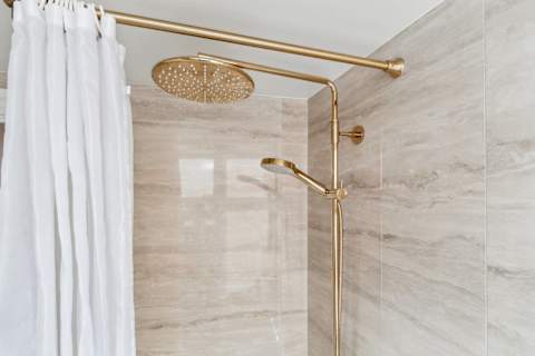 Gold rain shower head