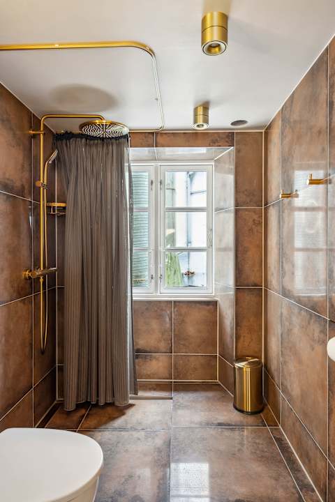 High End Bathroom with RainFall Showerhead Danish Design